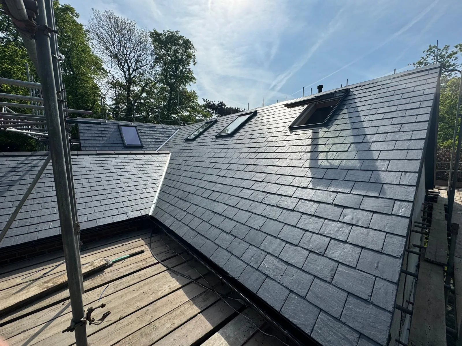 Tiled slate roof valley with roof windows