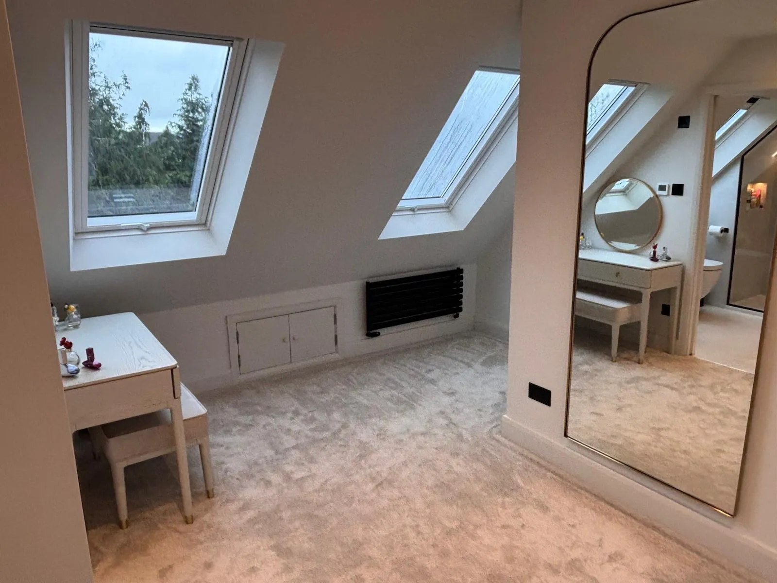 Loft dressing room with Velux skylights