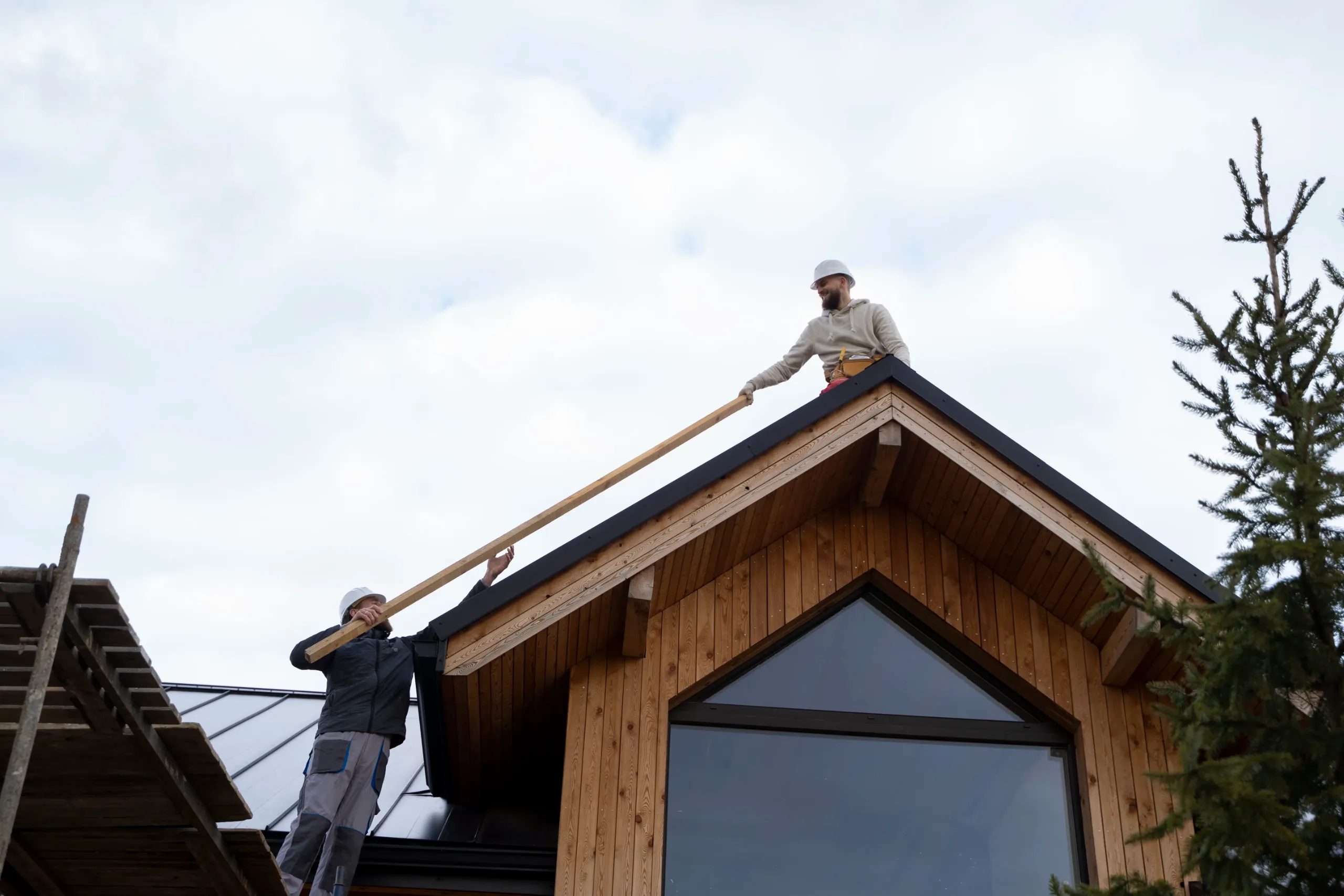 Loft conversion roof construction workers